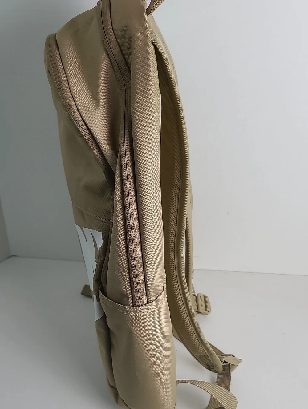 NWT NIKE Mulriple Zip Compartment Pockets Backpack Tan Beige with White Logo